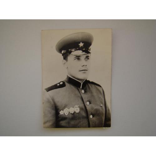 Старое фото рядового в парадной форме.