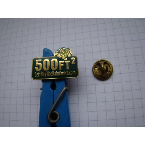 Значок участника благотворительной акции по защите тропических лесов.