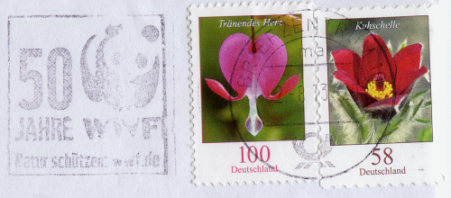 Конверт с двумя гашеными марками «Tränende Herz. Deutschland 100» и «Kuhscelle.  Deutschland 58».
