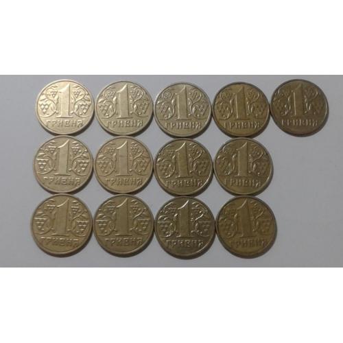 13 монет 1 гривна 2001 года. Завитки орнамента практически касаются канта.
