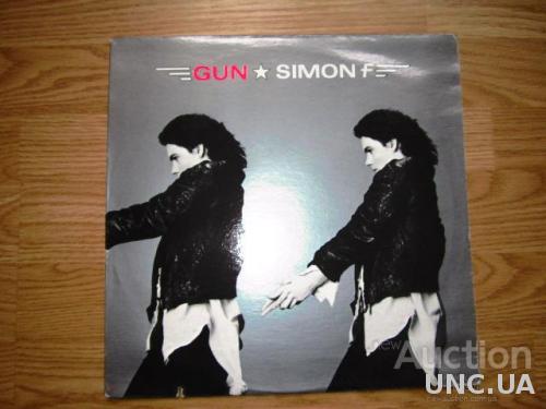  Simon F (MIKE + THE MECHANICS ) Gun US Nm
