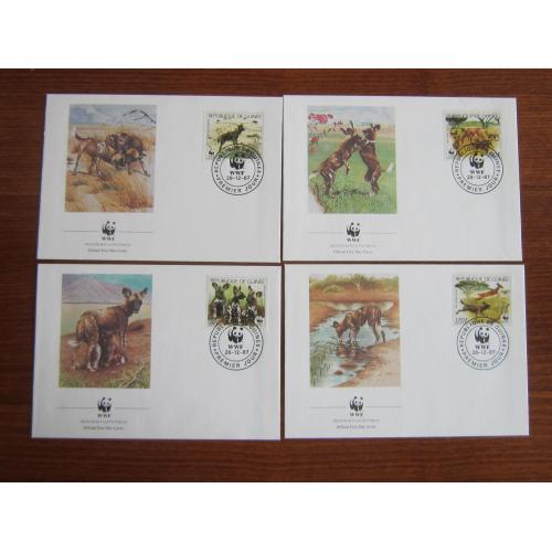 4 КПД Гвинея 1987 фауна гиеновидные собаки WWF конверты марки спецгашения КЦ 15 $