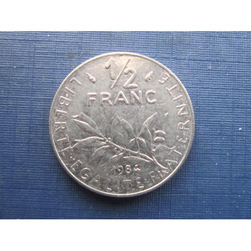 Монета 1/2 пол франка Франция 1984