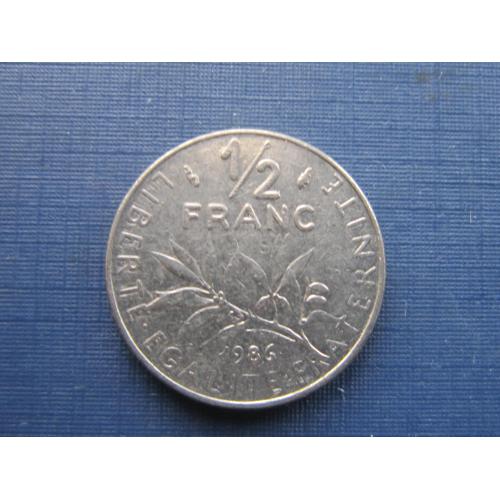 Монета 1/2 пол франка Франция 1986