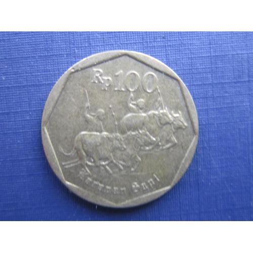 Монета 100 рупий Индонезия 1994 фауна гонки на быках