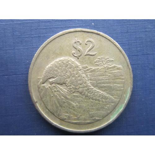 Монета 2 доллара Зимбабве 1997 фауна панголин
