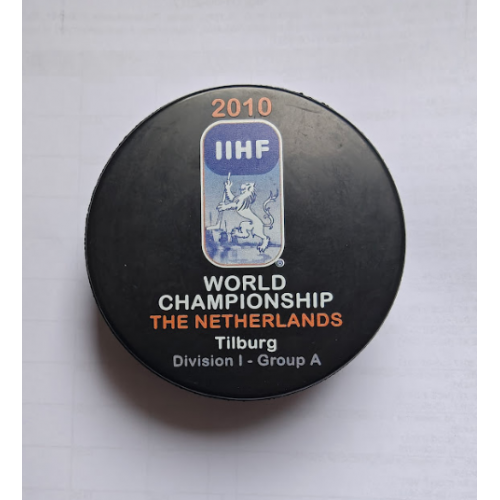 Хоккей- официальная игровая шайба IIHF чемпионат Мира 2010 див.I-А Нидерланды./участник сб. Украины/