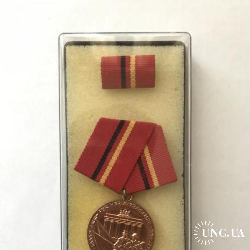 ГДР Бронзовая медаль "За заслуги в боевых дружинах рабочего класса" с документом