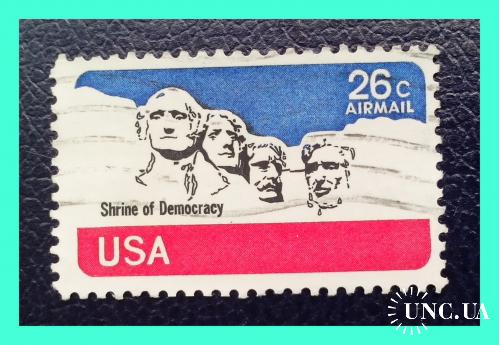 Почтовая марка  авиапочты  США  "Барельеф 4-х президентов" (5).