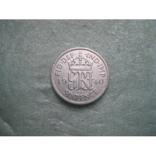 Великобритания. 6 пенсов 1940 г.Серебро ..Оригинал. Состояние.