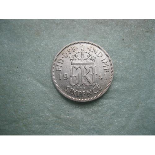 Великобритания. 6 пенсов 1941 г.Серебро ..Оригинал. Состояние.