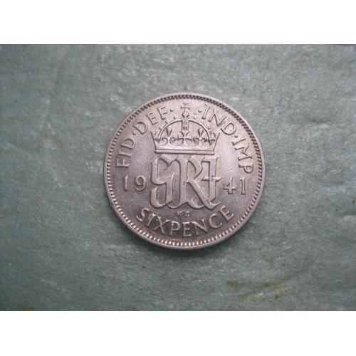 Великобритания. 6 пенсов 1941 г.Серебро ..Оригинал. Состояние.