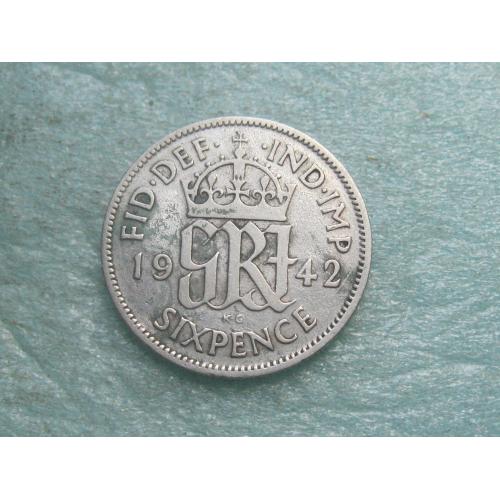 Великобритания. 6 пенсов 1942 г.Серебро ..Оригинал. Состояние.