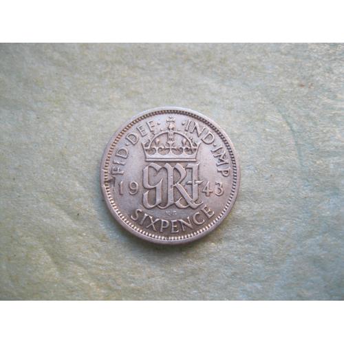 Великобритания. 6 пенсов 1943 г.Серебро ..Оригинал. Состояние.