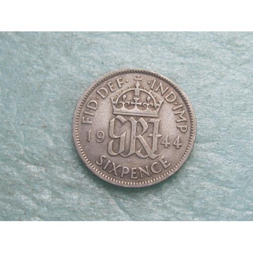Великобритания. 6 пенсов 1944 г.Серебро ..Оригинал. Состояние.(3)