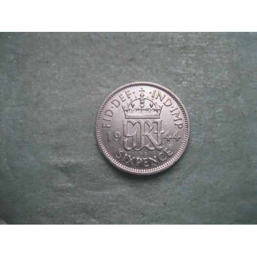 Великобритания. 6 пенсов 1944 г.Серебро ..Оригинал. Состояние.