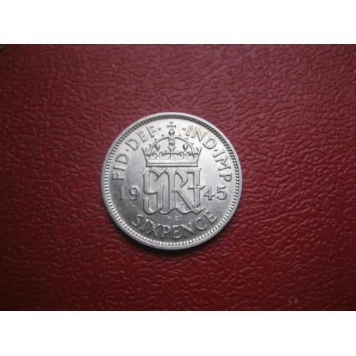 Великобритания. 6 пенсов 1945 г.Серебро ..Оригинал. Состояние.XF-UNC,