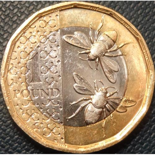 1 фунт Британія 2025