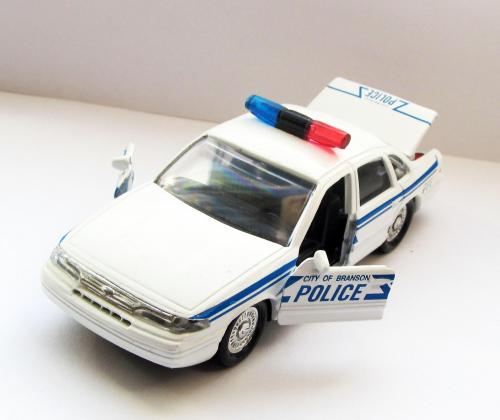 Ford Crown Victoria Branson City Police 1994 1:43 Road Champs белый