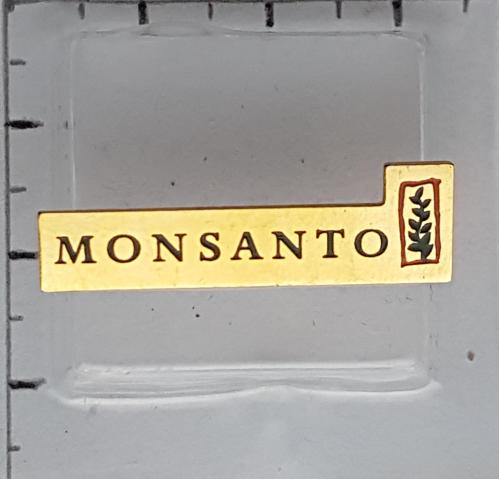 Значок у важк. мет. Monsanto Company — многоотраслевая транснациональная компания