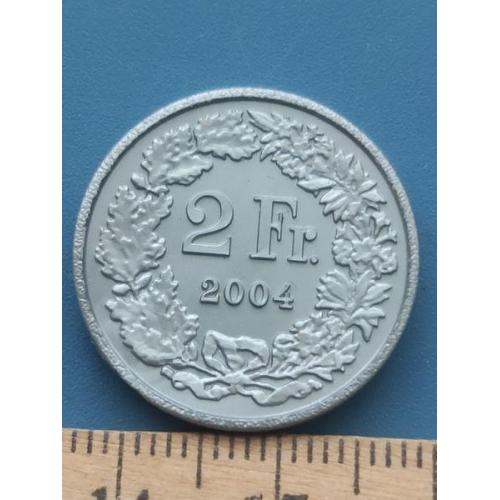 Швейцария - Жетон - пластмасса - 2 франка 2004 года - Б/У .