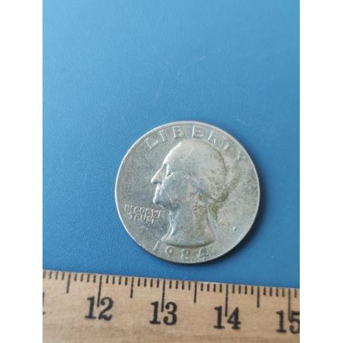 США - 25 центов 1984 год - монетный двор , буква ( Р ) . Б/У .