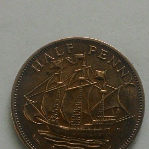 Half penny 1958 года.