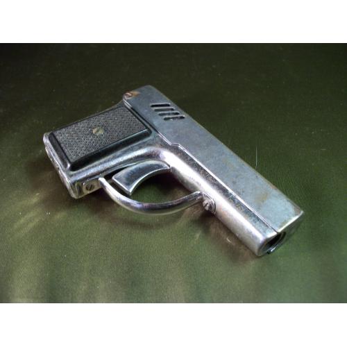 5.292 Старая бензиновая зажигалка - пистолет.