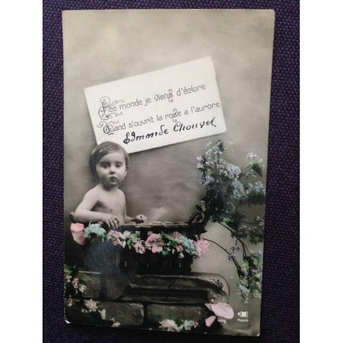Французская фотооткрытка. Малыш в цветочной корзинке. 1912 г.