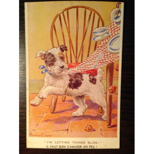 Французская открытка. Собачка тянет скатерть со стола.