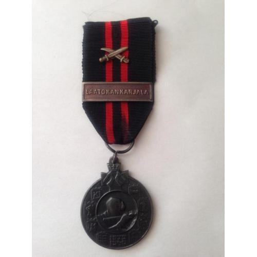 Медаль 1939-1940 гг, с планкой LAATOKANKARJALA и Мечами