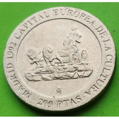 Длинная надпись над колесницей - Юб. Испания 200 песет 1991 г.