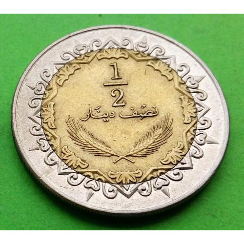  Ливия 1/2 динара 2004 (1372) г. - биметалл, нечастая