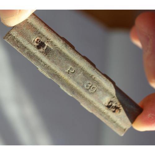 Частина затискача обойми для патронів