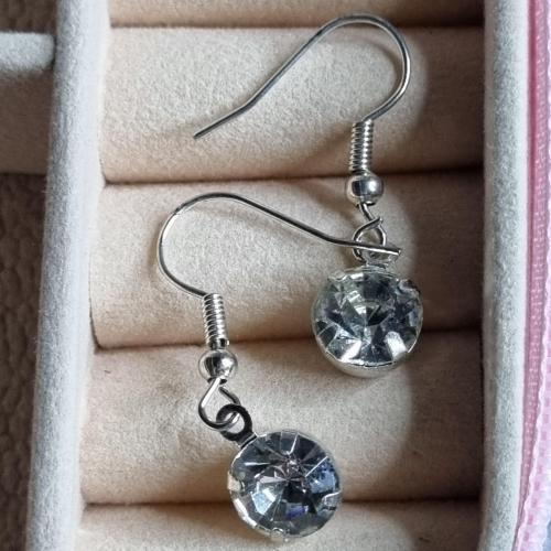 Сережки — прозорий камінь і метал