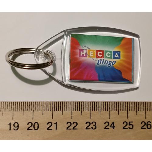Акриловый брелок с логотипом Mecca Bingo. 