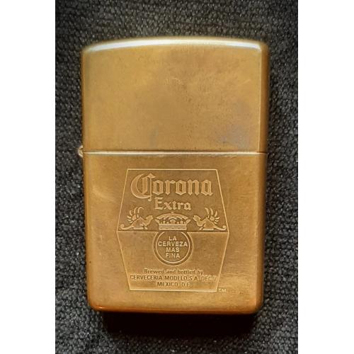 Коллекционная латунная зажигалка Zippo с гравировкой логотипа пива Corona Extra. 